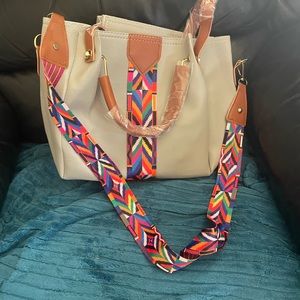 Cute grey purse with boho pattern strap. Comes with two small pouches. NWOT